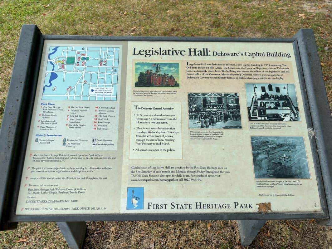 A plaque containing information on the history of Legislative Hall.