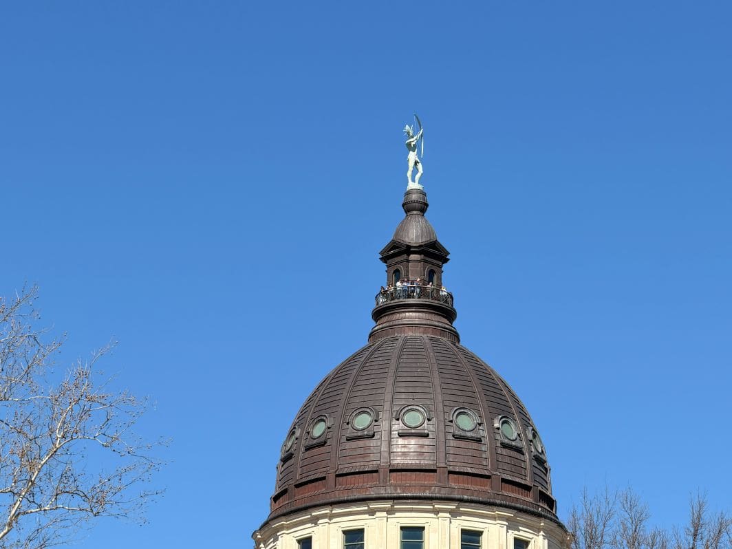 People outside touring the dome. 